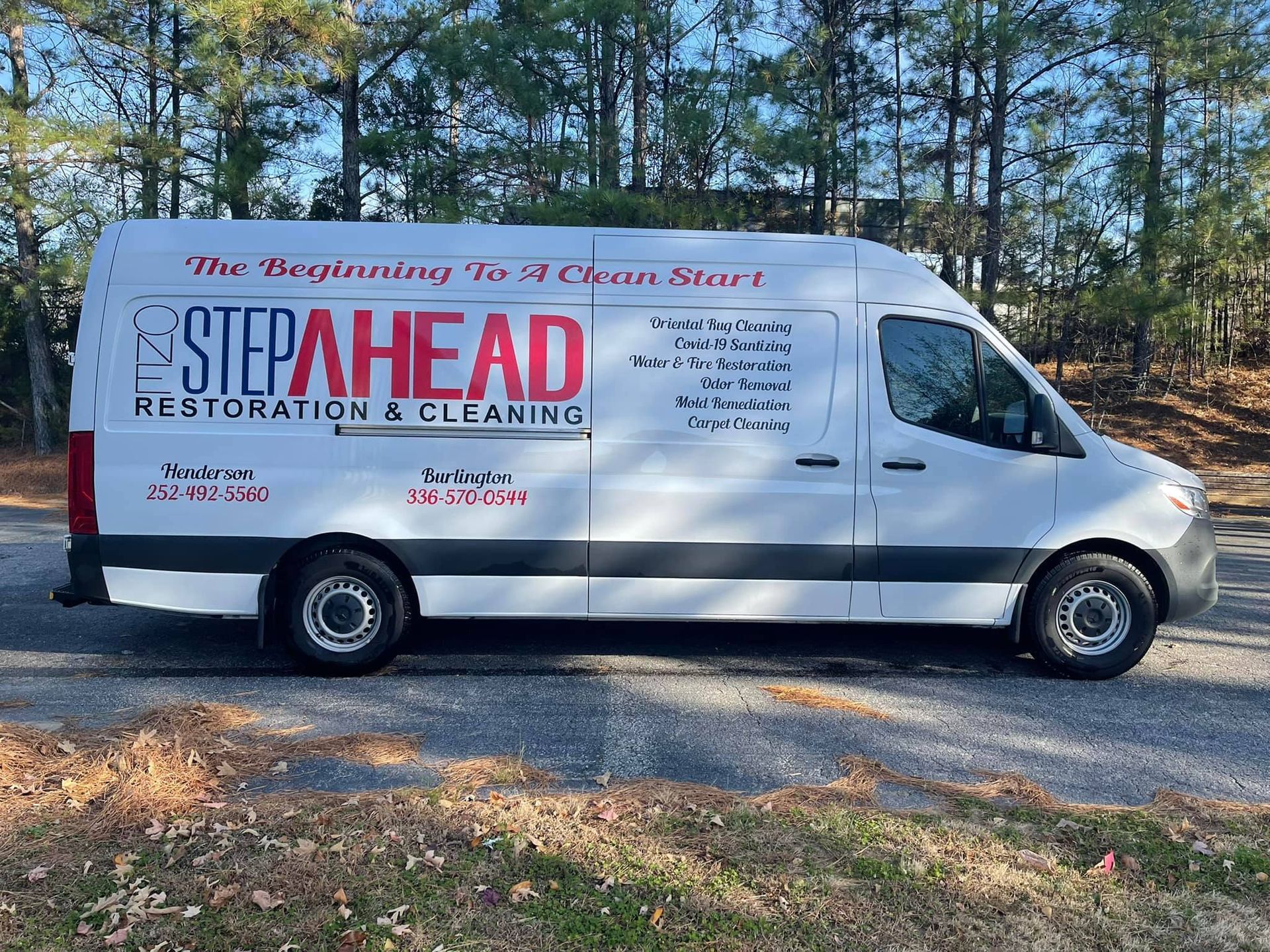 A stepahead van is parked on the side of the road