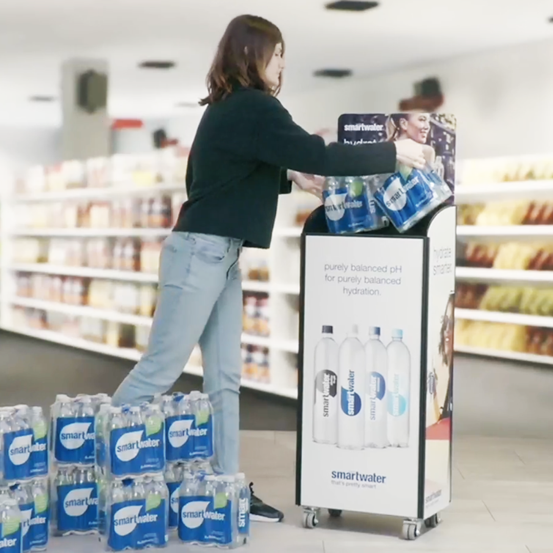 An organised retail aisle with a compact Vertical Vendors display, showing an efficient use of space