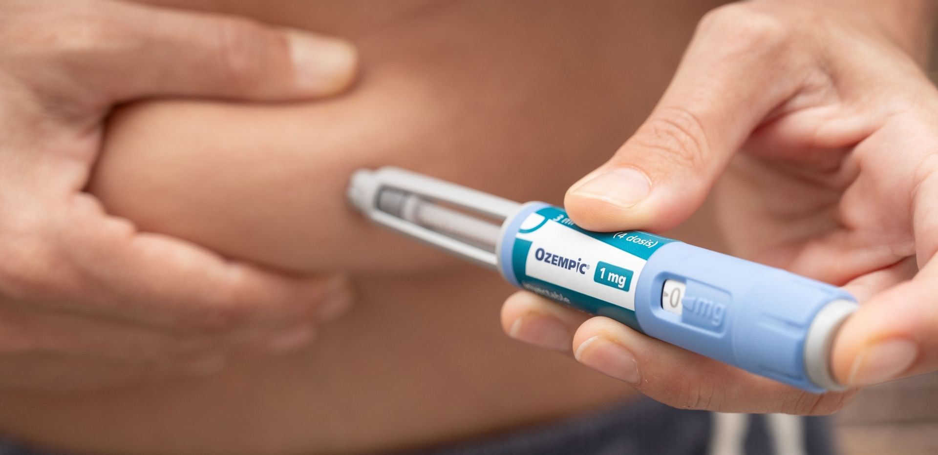 Premium metal retail display with spring-loaded mechanisms