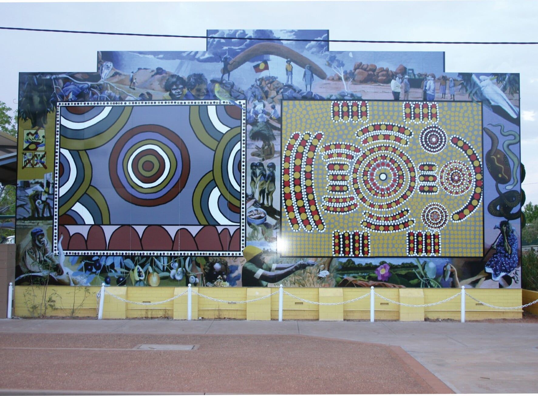A Large Mural on the Side of a Building Says Read Free — Bluey's Signs in Ciccone, NT