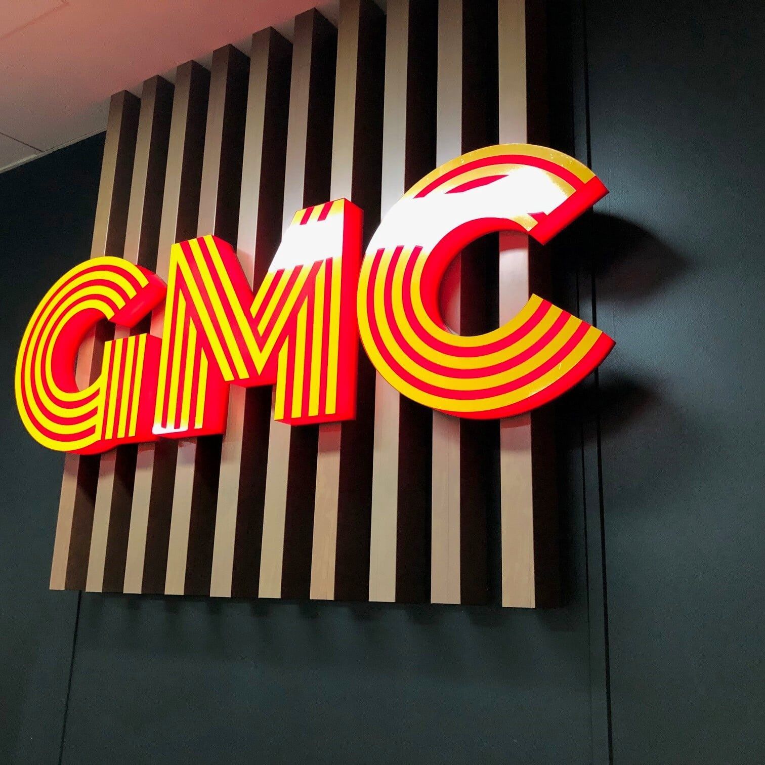 A Gmc Sign That is on a Wall — Bluey's Signs in Ciccone, NT