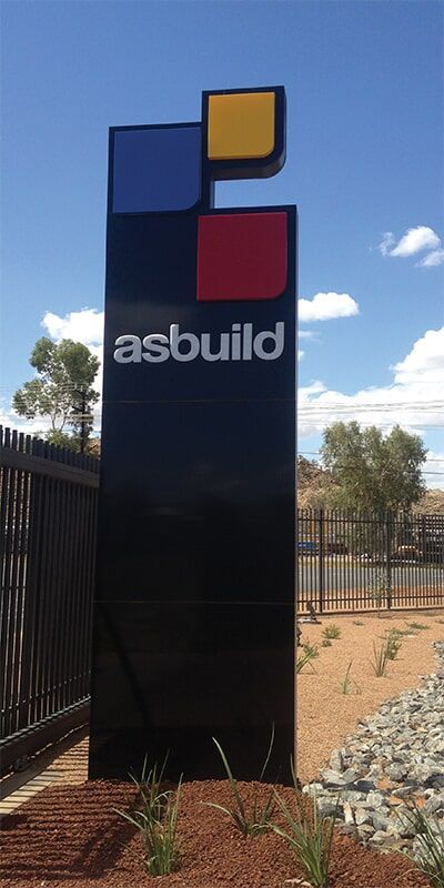 A Tall Black Sign With the Word Asbuild on It — Bluey's Signs in Ciccone, NT