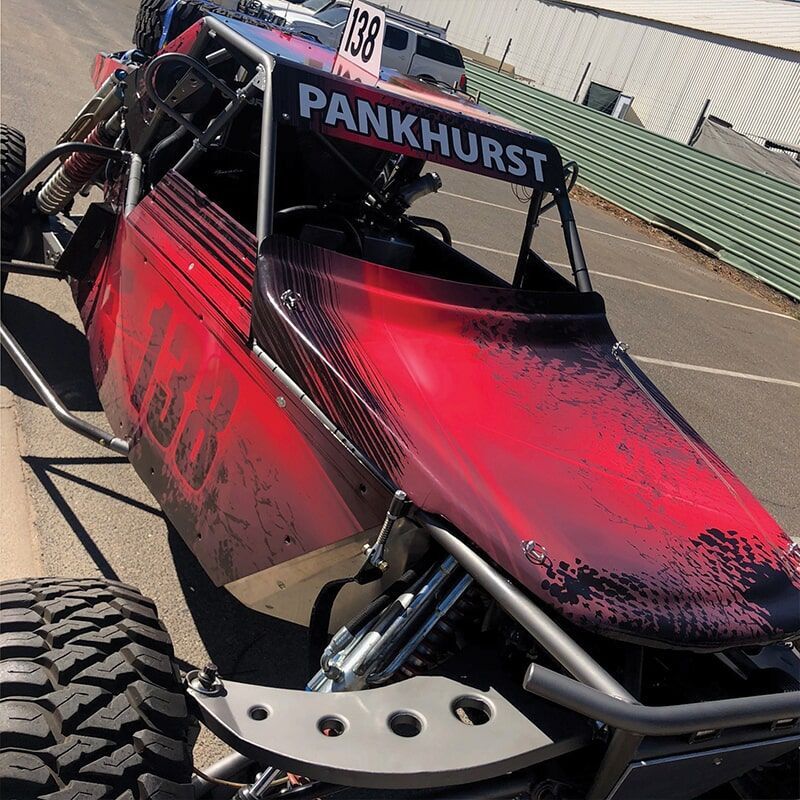 A Red Buggy With the Word Pankhurst on It — Bluey's Signs in Ciccone, NT