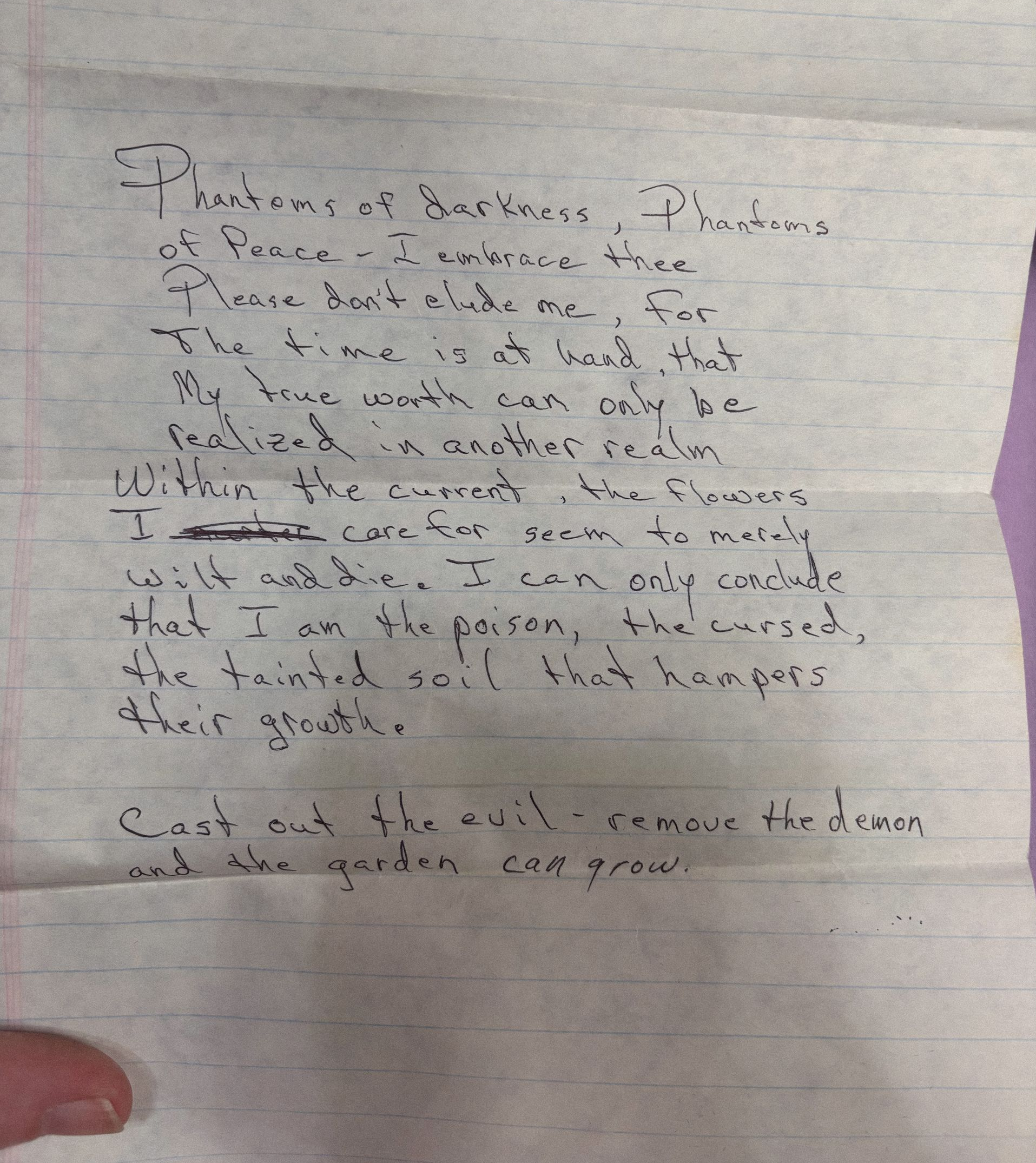 photograph of handwritten poem on notebook paper about darkness, Phantoms of darkness, Phantoms of Peace, feeling like poison, and inevitable growth through darkness, written in the 1990's by the father of Lauren Nixon-Matney author and creator of Searching for Stars a millennial's experimental multimedia  memoir universe experience.  