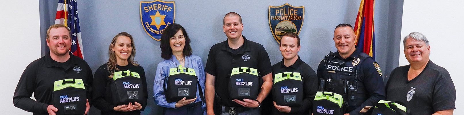 Participants in the Health First-funded Griffith Blue Heart program pose with AEDs in Flagstaff.