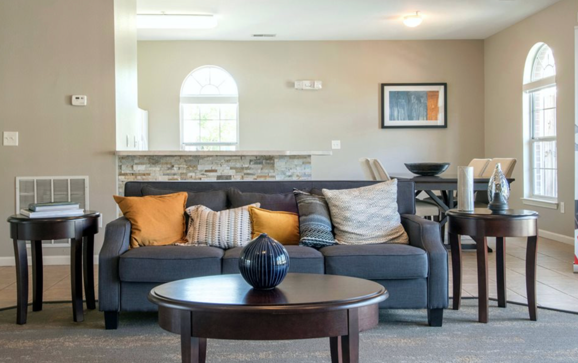 A living room with a couch and a coffee table