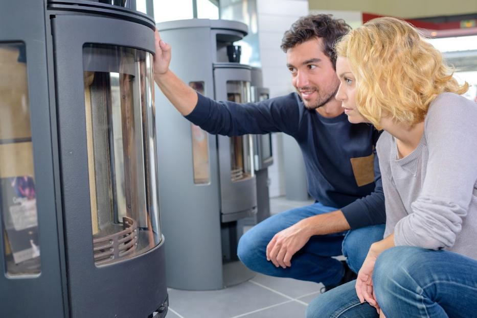 Couple Checking the Furnace — Ogden, UT — Comfort Solutions