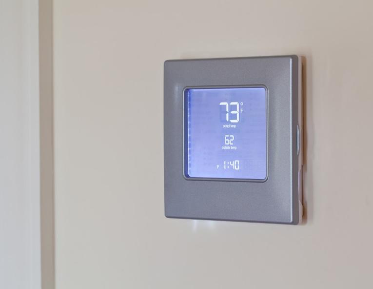 AC Repairs — Thermostat Showing The Temperature Of The Room in Ogden, UT