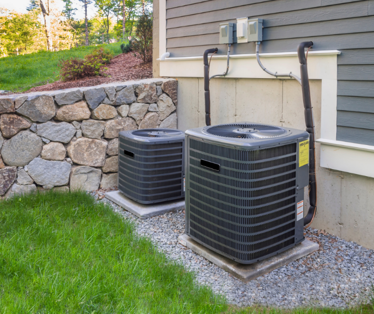 AC System Experts — Air Conditioning Units Outside An Apartment  in Ogden, UT