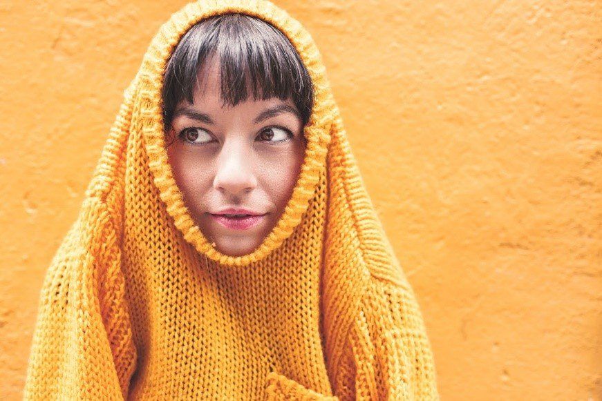 Woman with Yellow Sweater — Ogden, UT — Comfort Solutions Woman with Yellow Sweater — Ogden, UT — Comfort Solutions