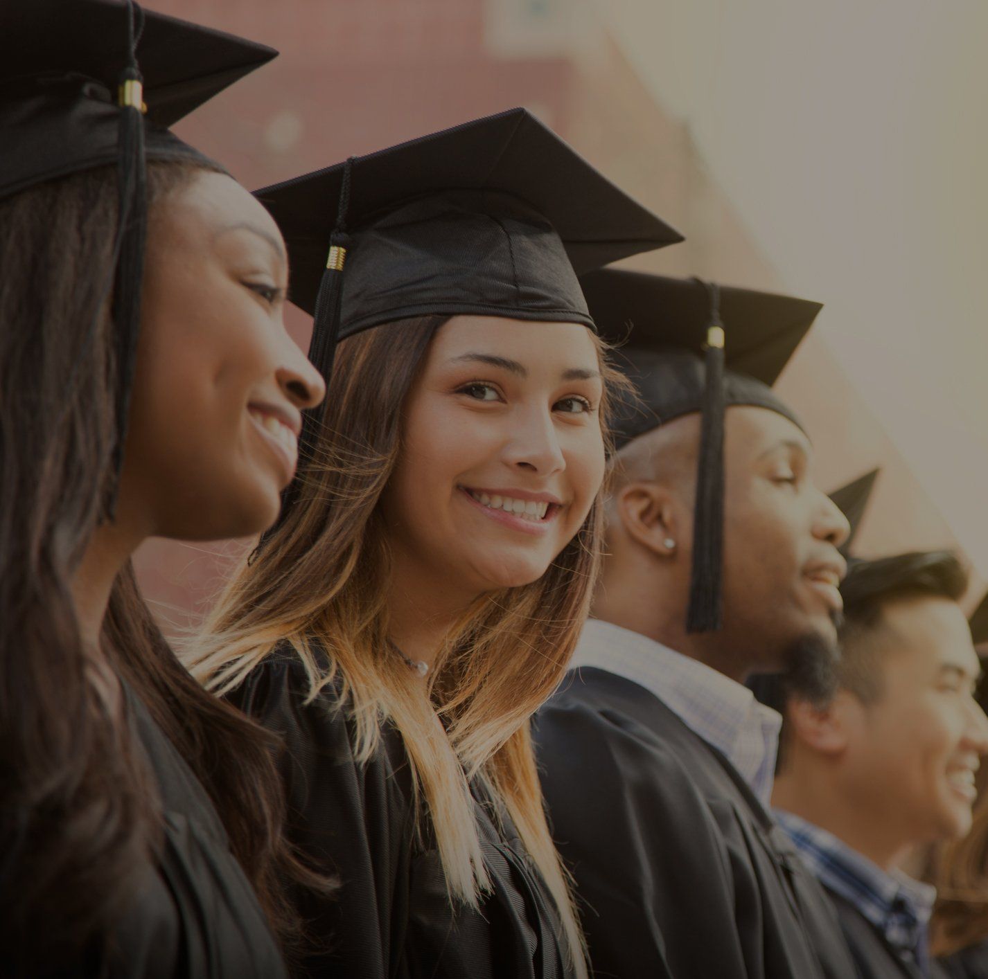 Latin descent female college student graduation on campus — Clarkston, WA — LifeTrack Services, Inc