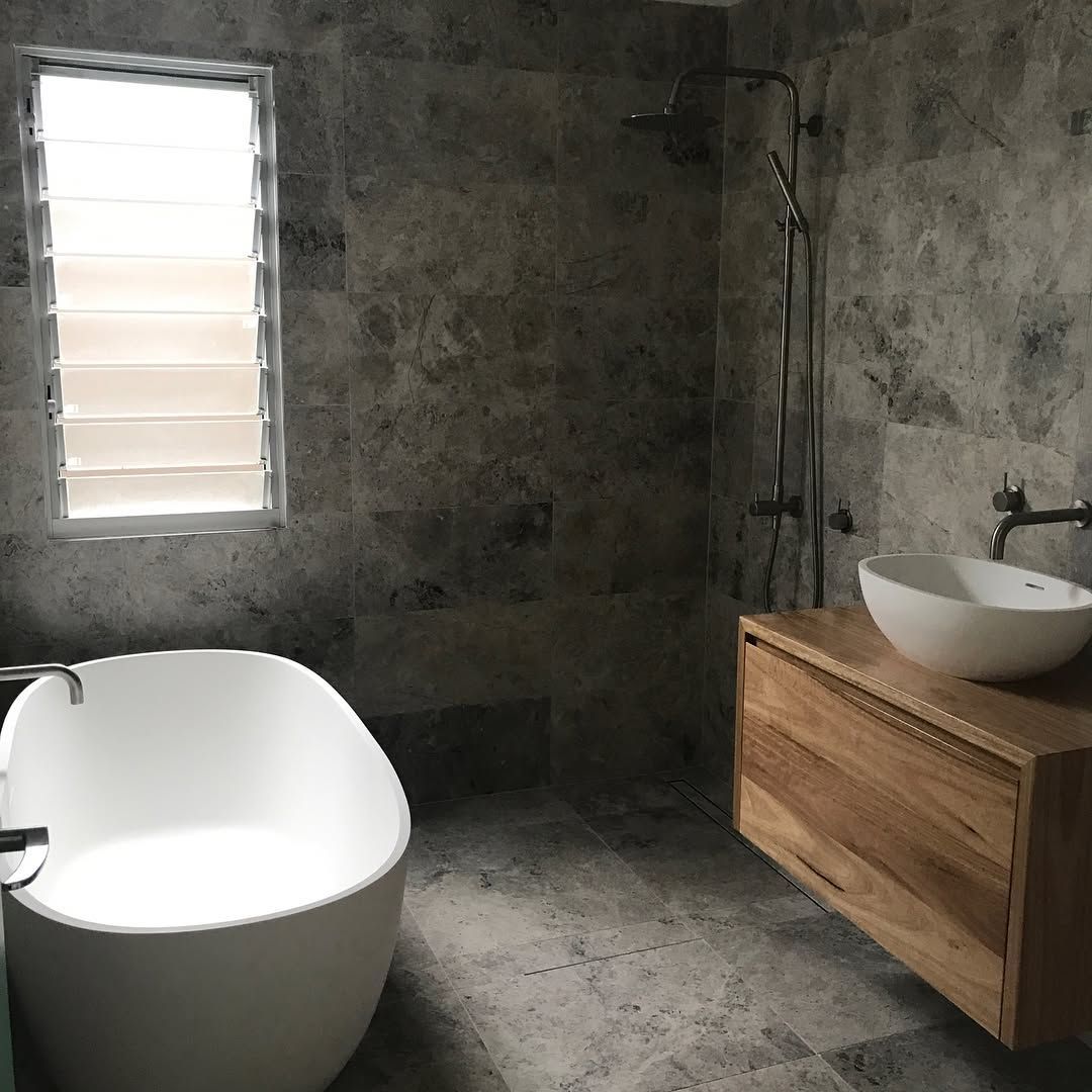 A Bathroom With a Bathtub , Sink and Shower — Dean Gray Tiling in Palm Beach, QLD