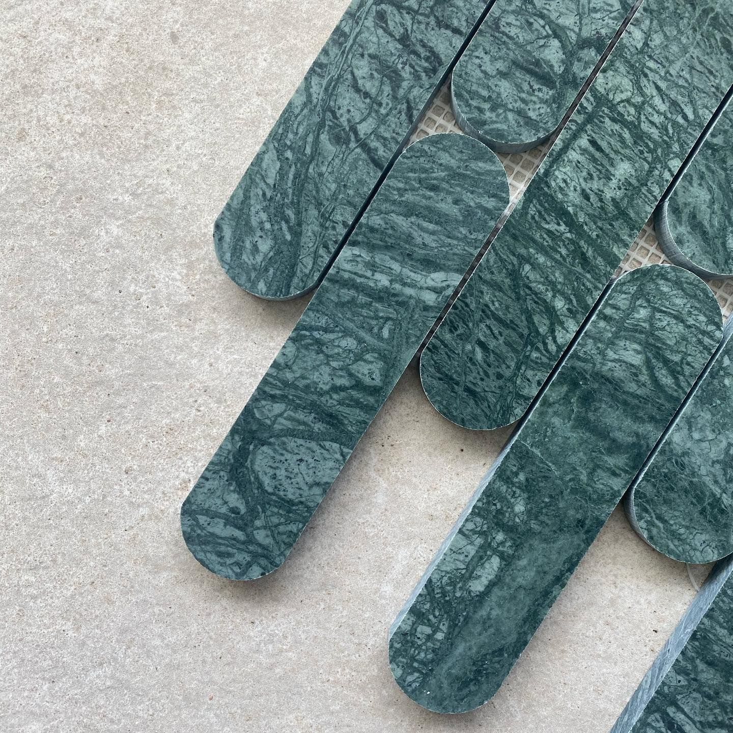 A Black Pendant Light Hangs From a Blue Tiled Wall — Dean Gray Tiling in Hastings Point, NSW
