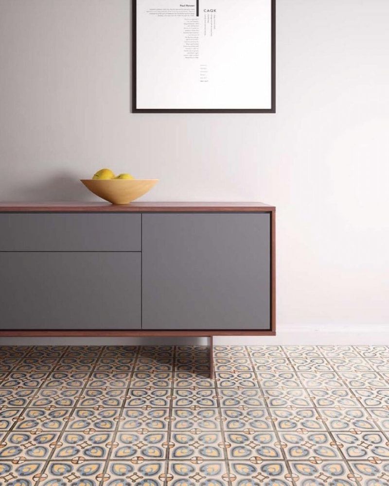 A Dresser With a Bowl of Lemons on Top of It in a Room — Dean Gray Tiling in Banora Point, NSW
