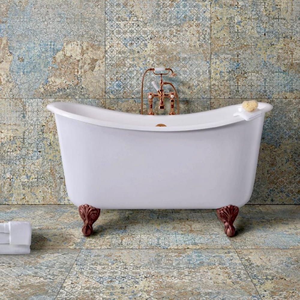 A White Bathtub With Copper Faucets in a Bathroom — Dean Gray Tiling in Tweed Heads, NSW