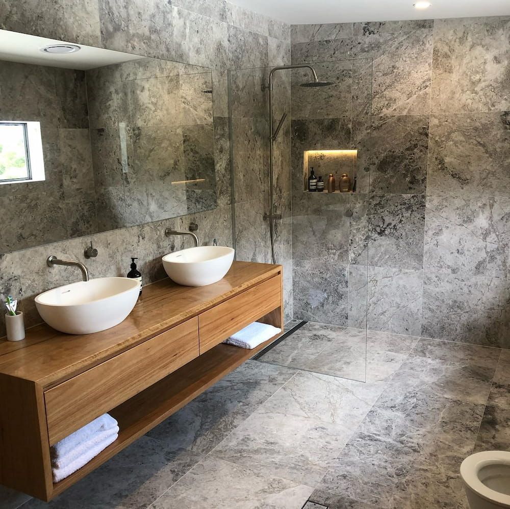 A Bathroom With Two Sinks and a Toilet — Dean Gray Tiling in Palm Beach, QLD