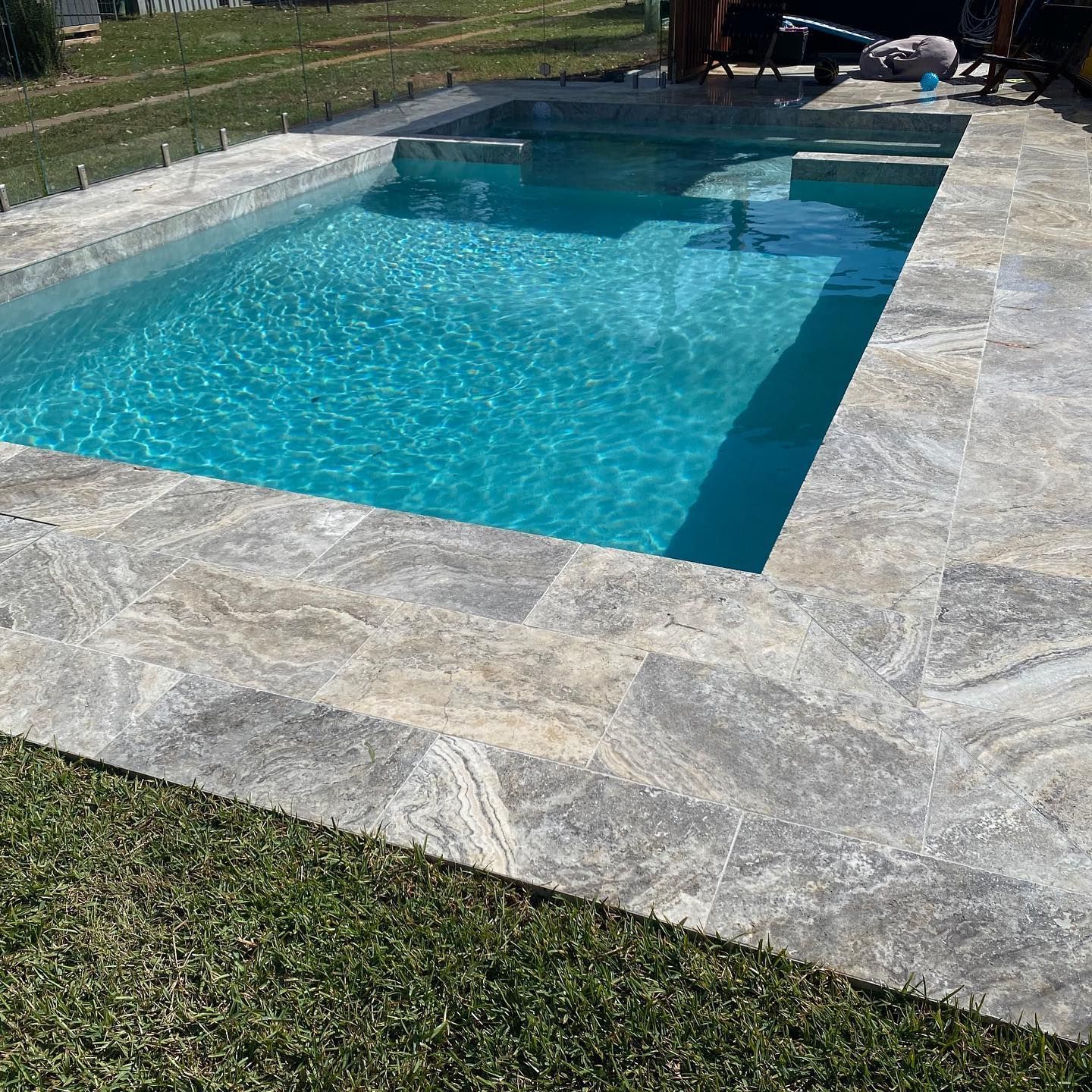 A Chevron Tile on Top of a Wooden Table — Dean Gray Tiling in Hastings Point, NSW