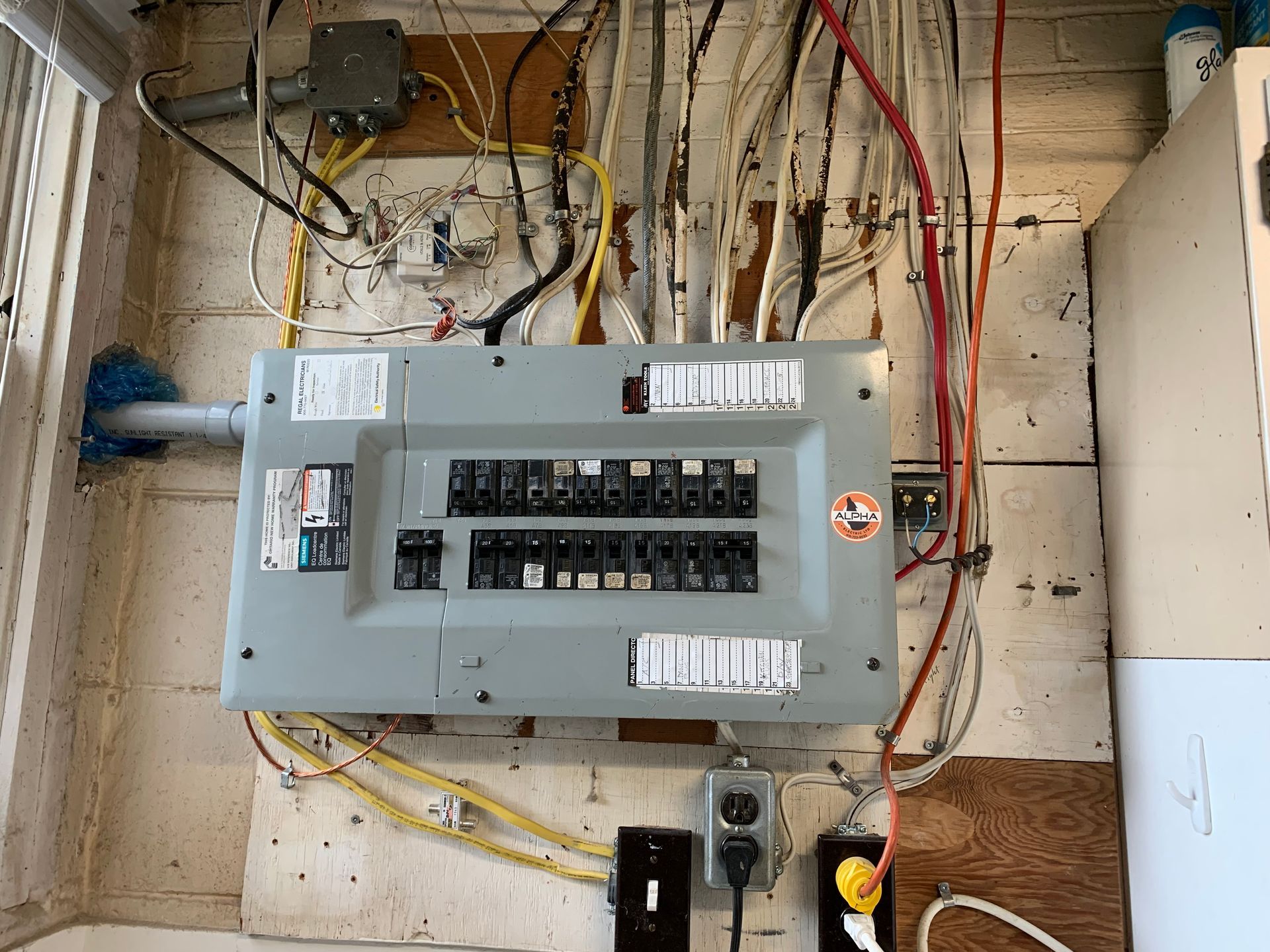 A close up of an electrical box on a wall.