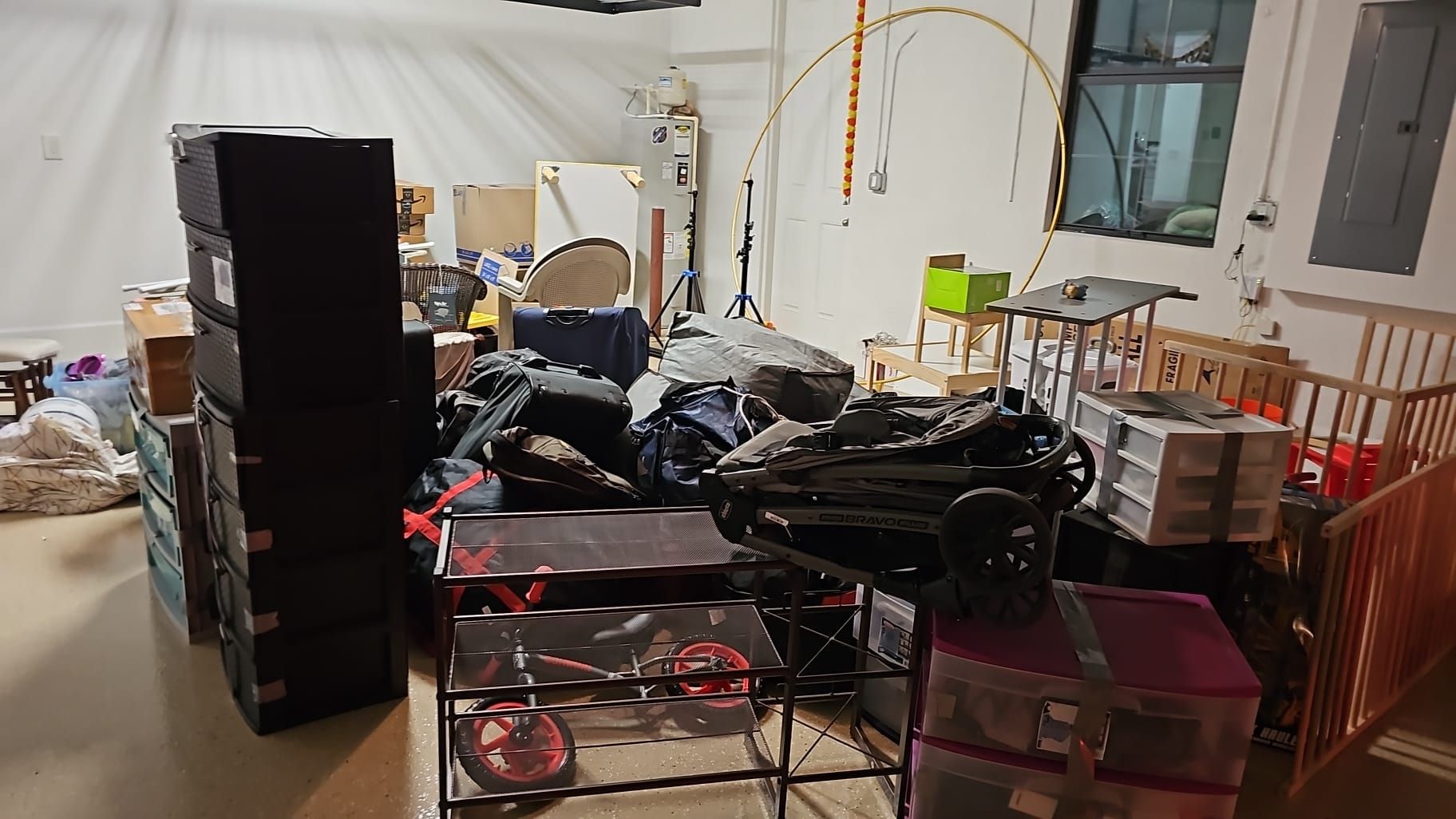 A messy room filled with lots of boxes and boxes.