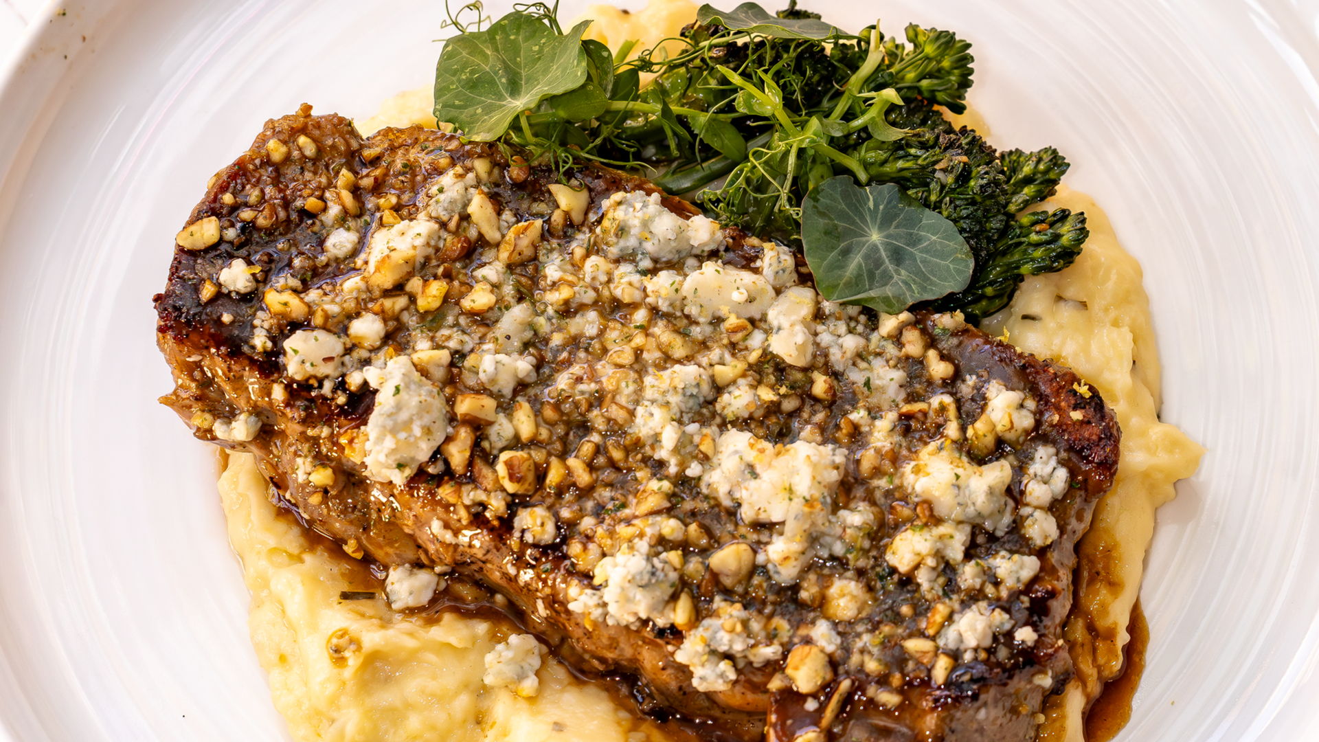 Steak on a bed of mashed potatoes