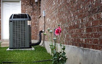 Residential HVAC — Air Condition on House Backyard in Dallas, TX