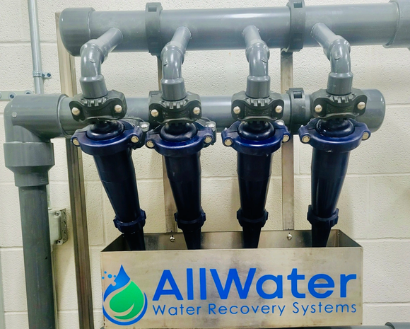 piping for a water reclaim system that says AllWater water recovery systems on it