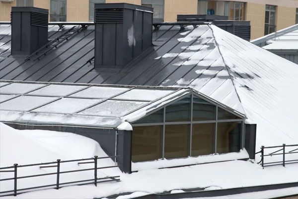 snowy metal roof