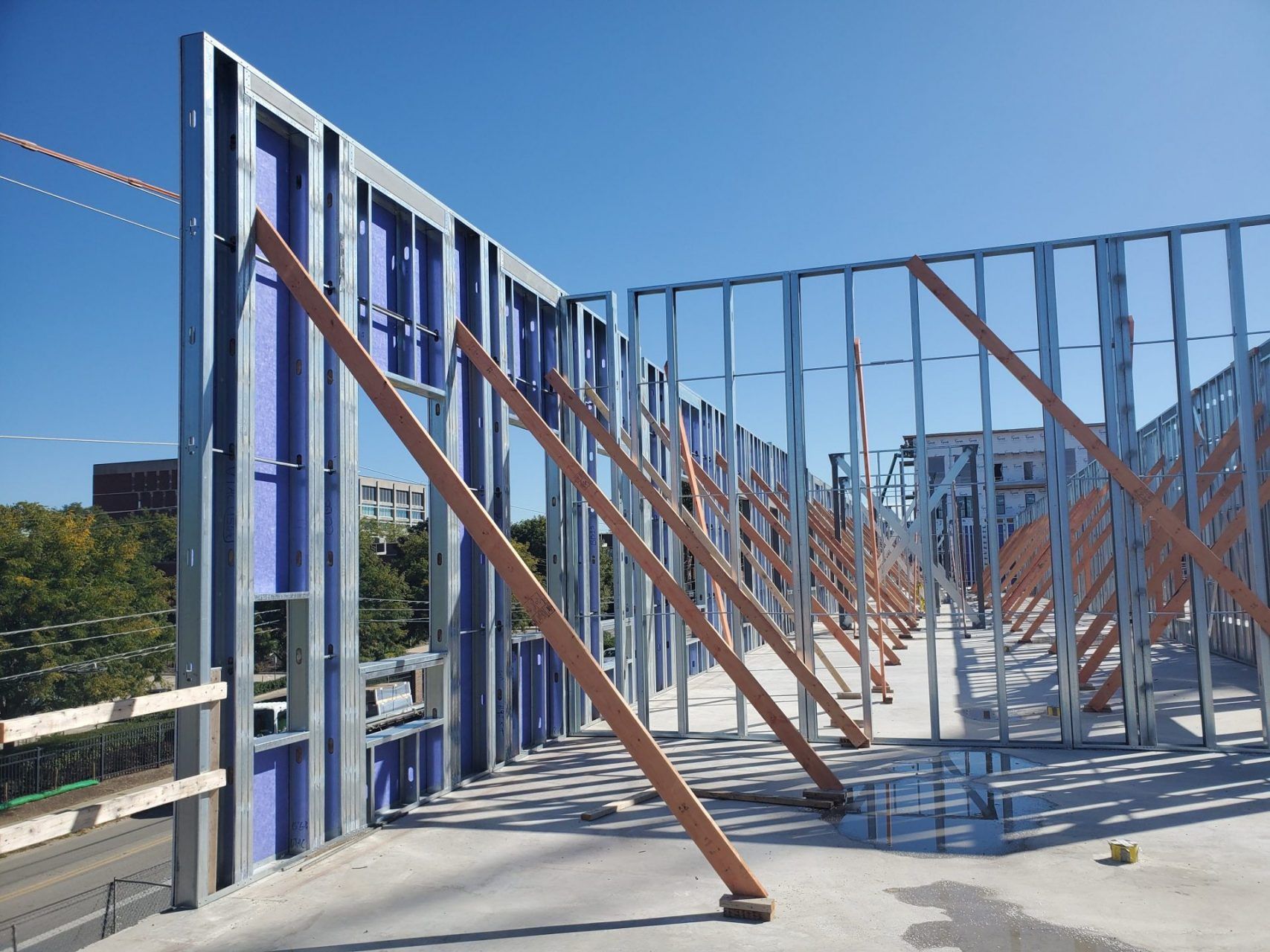 A building under construction with a lot of metal frames.