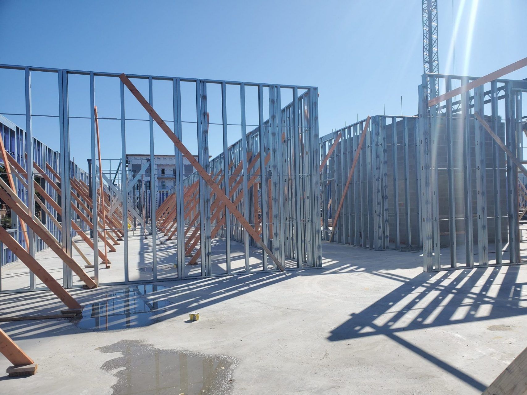 A building under construction with a lot of metal frames.