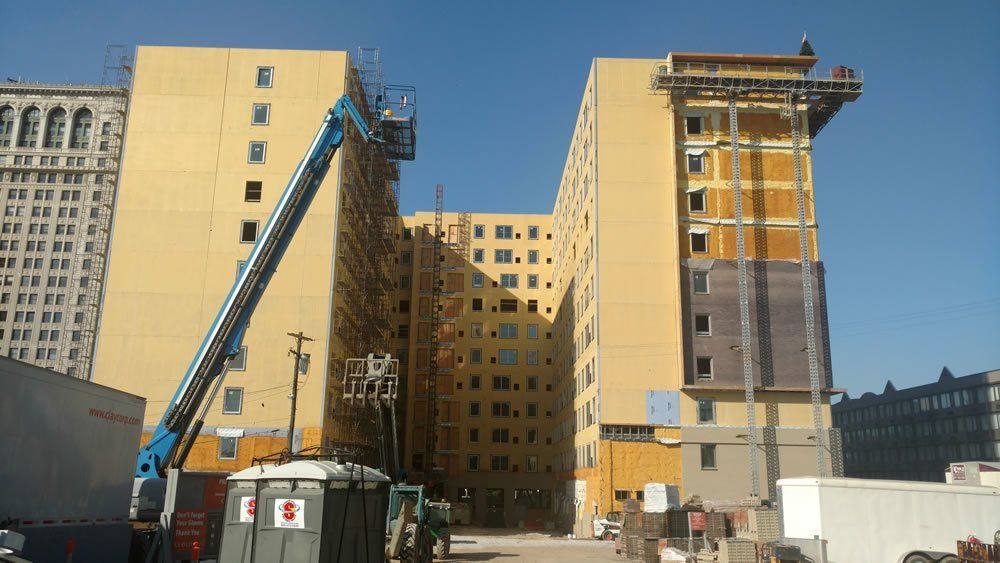 A construction site with a large building under construction.