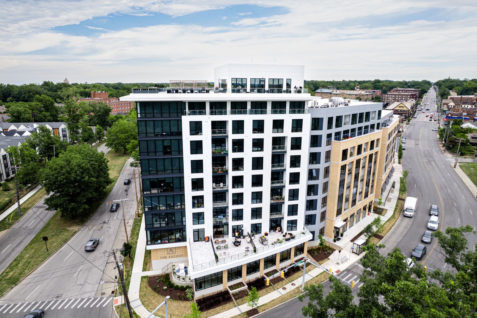 An aerial view of a large building in the middle of a city.