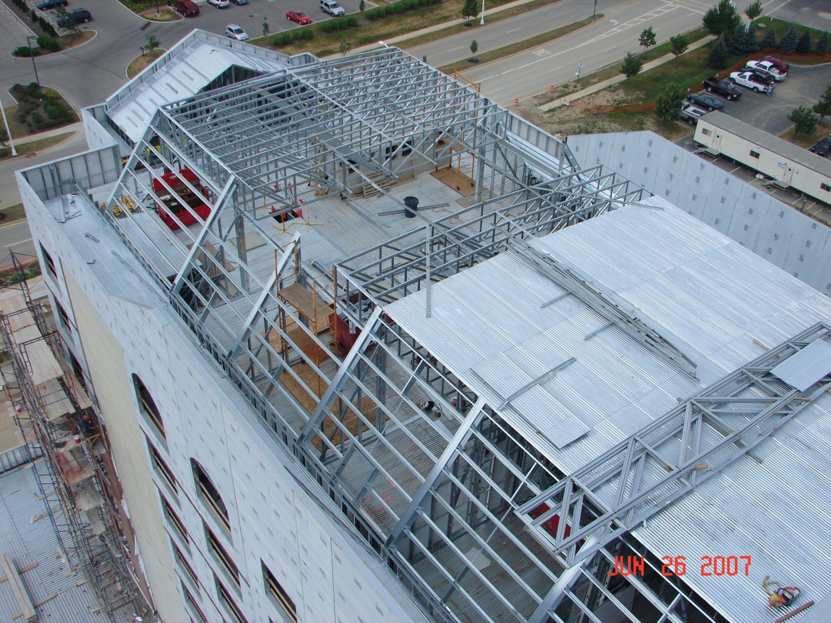 An aerial view of the roof of a building under construction.