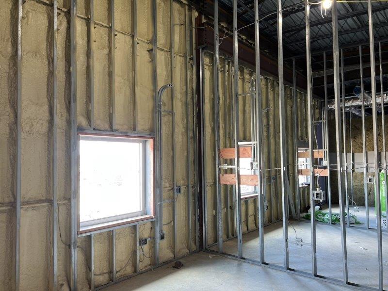 A room with a lot of walls and a window.