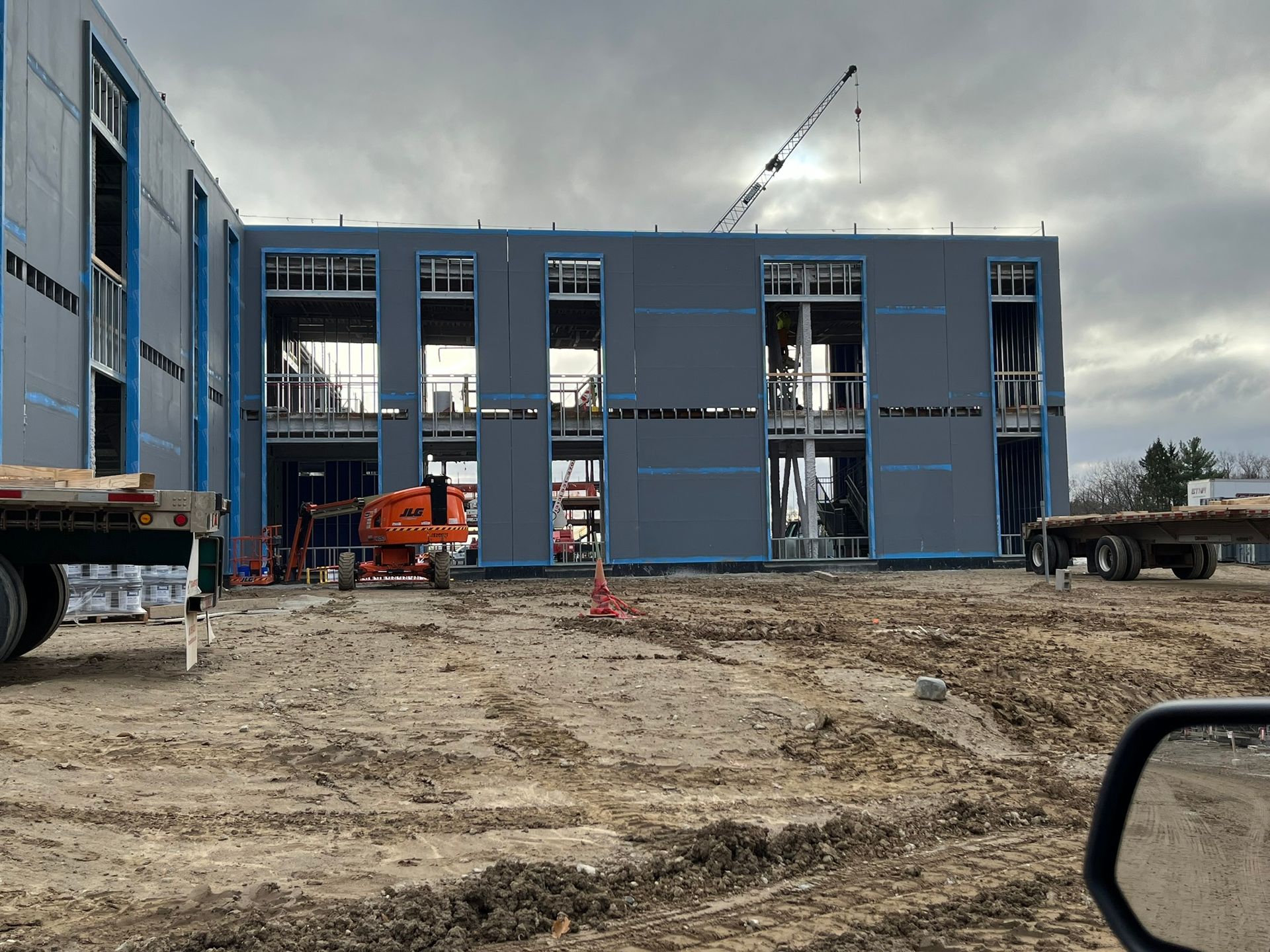 Building being built with large windows