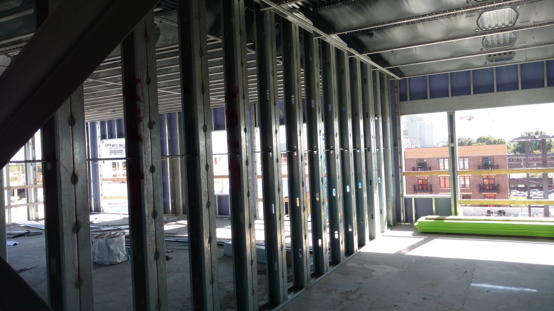 A building under construction with a lot of metal walls.