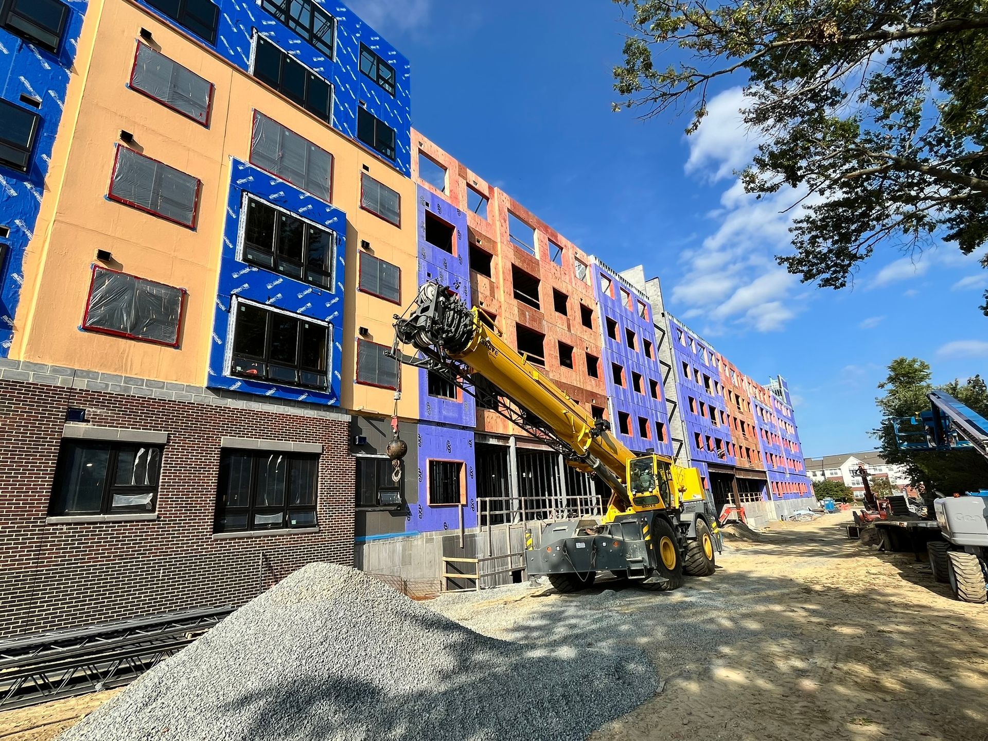  A large building with a lot of windows is being built