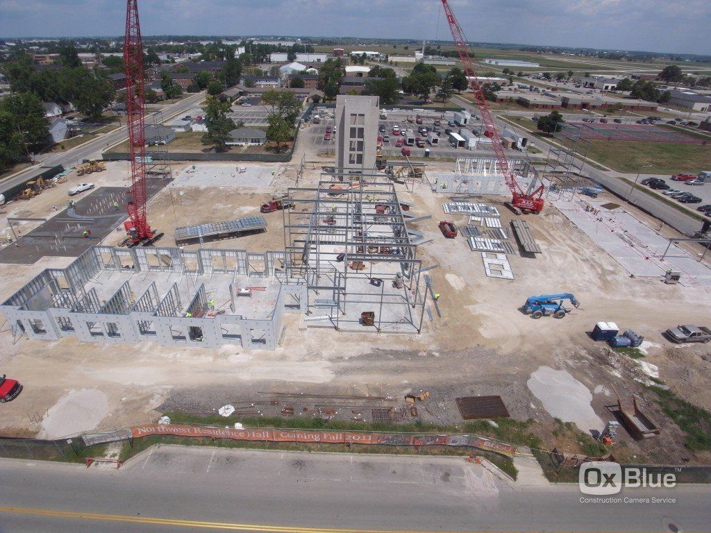 An aerial view of a large building under construction.