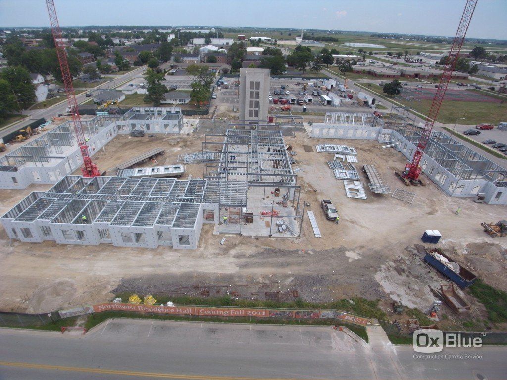 An aerial view of a large building under construction.