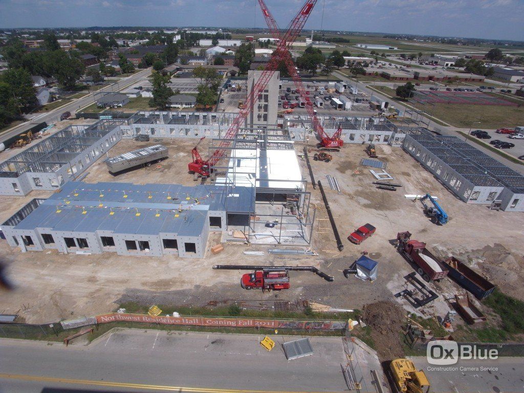 An aerial view of a large building under construction.