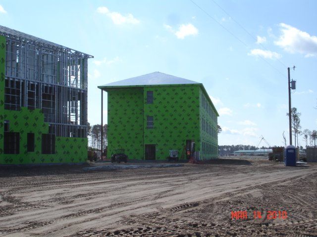 A building that is being built with green insulation.
