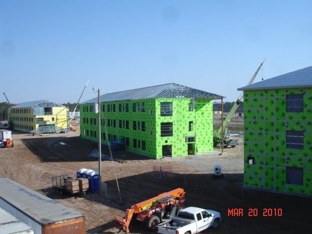 A photo of a large building being constructed.