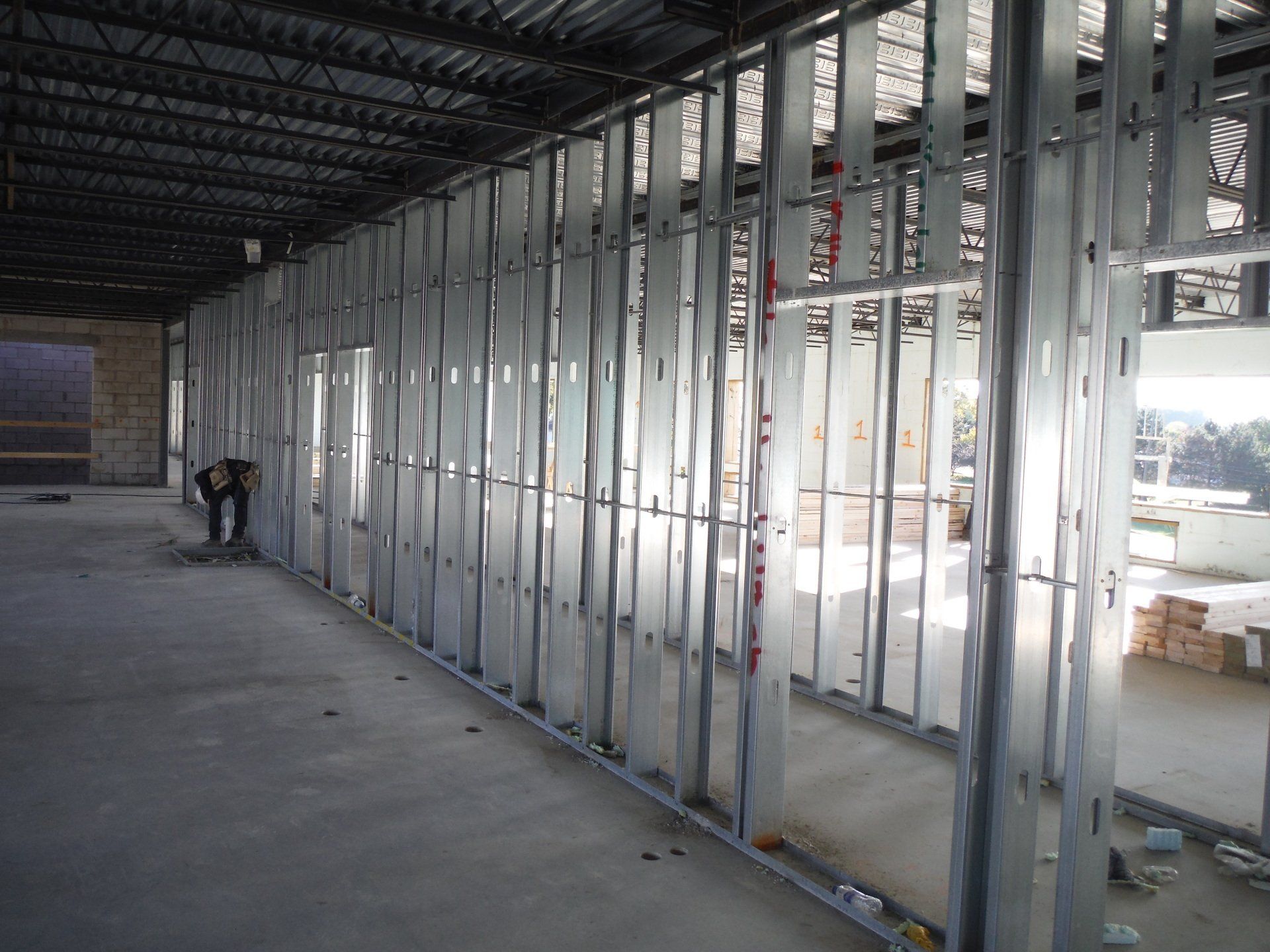 A building under construction with a lot of metal walls.