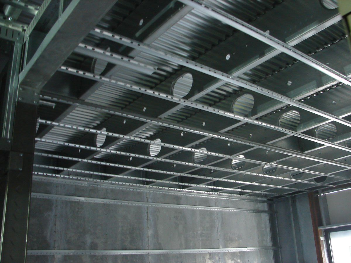 A room with a ceiling that is being built.