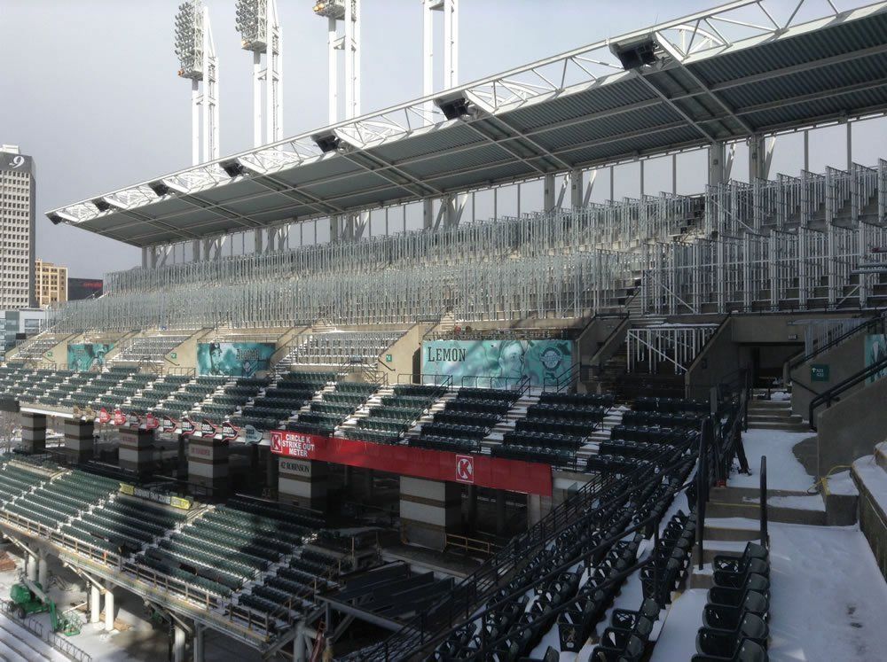 A stadium with empty seats and a sign that says 01.