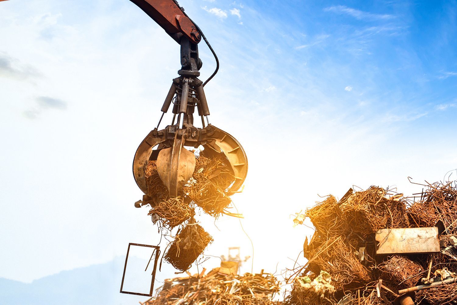 Cranes grab scrap for quick loading and smooth handling in active scrap yards. Cranes grab scrap for quick loading and smooth handling in active scrap yards.