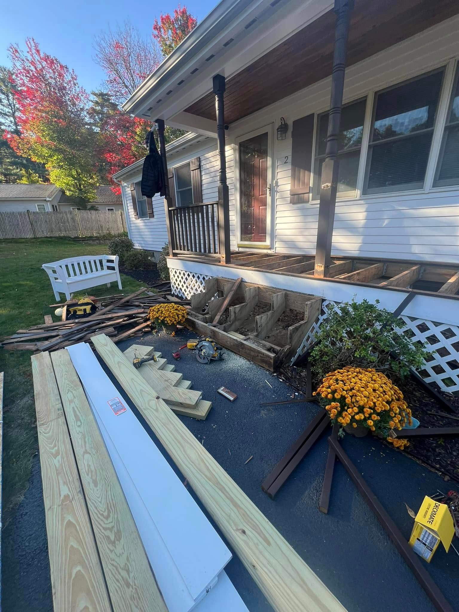 A house with a porch that is being remodeled.