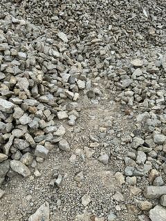 A pile of rocks and dirt on the ground.