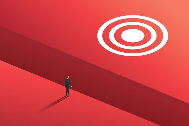 A man is standing in front of a target on a red background.