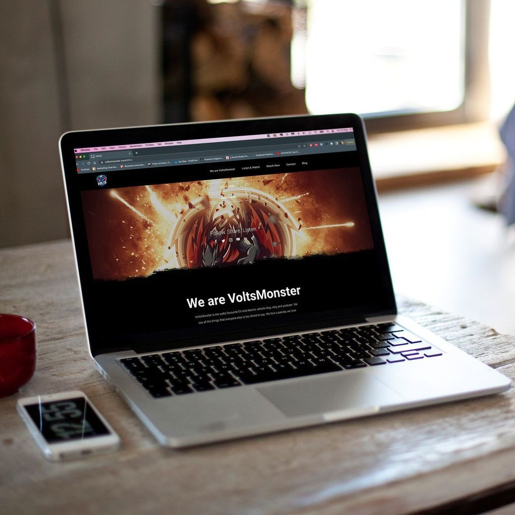 a laptop is open to a web page that says we are voltsmonster.com