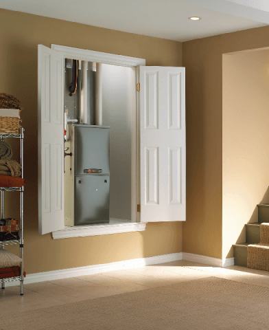 a closet with a furnace inside of it